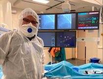 Russian interventional cardiologist Alexey Pankov in full PPE for a cath lab procedure in Moscow.