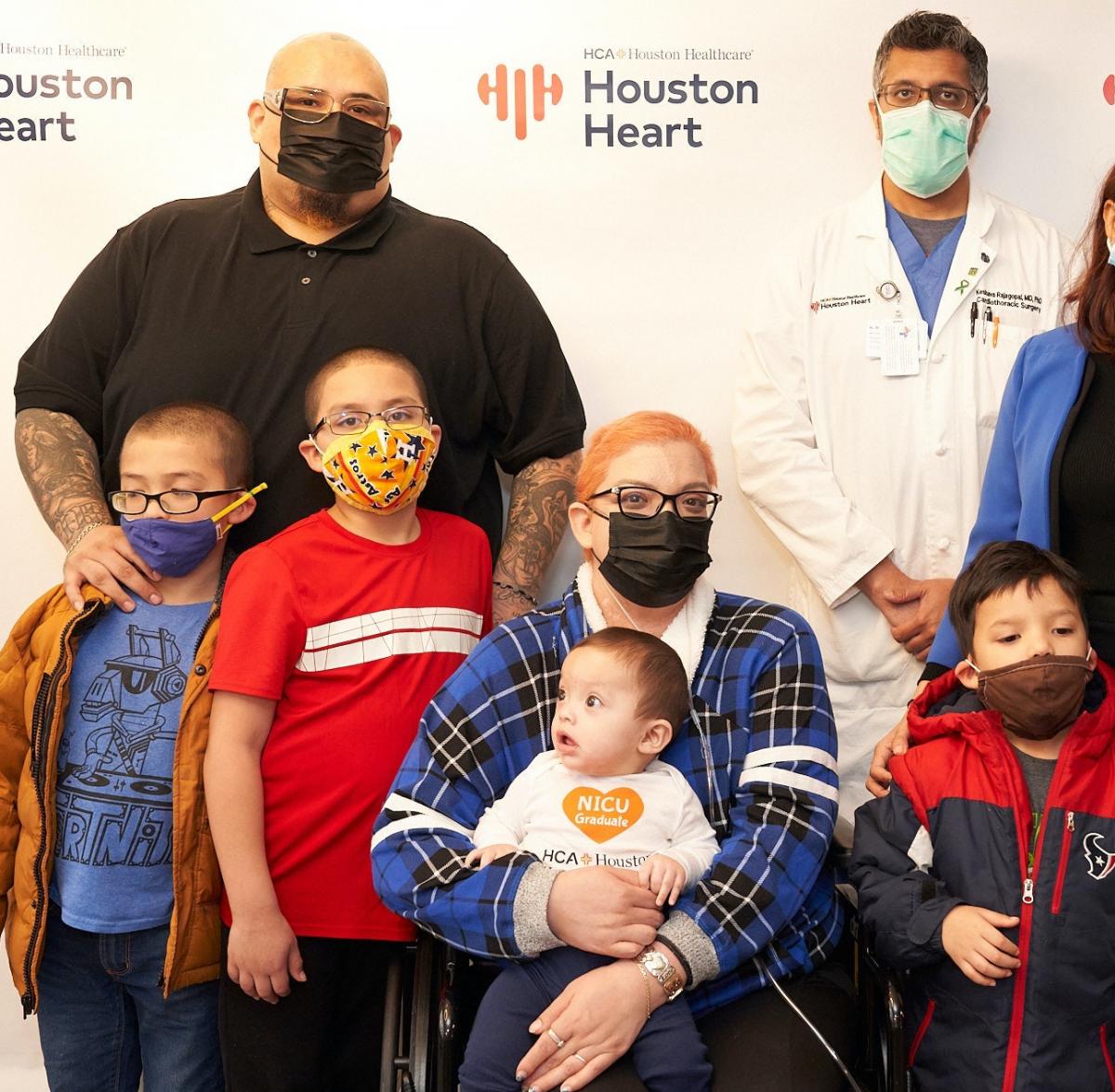 Cardiovascular surgeon Keshava Rajagopal, M.D., Ph.D., is credited with saving COVID patient Crystal Gutierrez because of implementing ECMO support to reversed her profound respiratory failure. Pictured here with her family at Houston Heart..