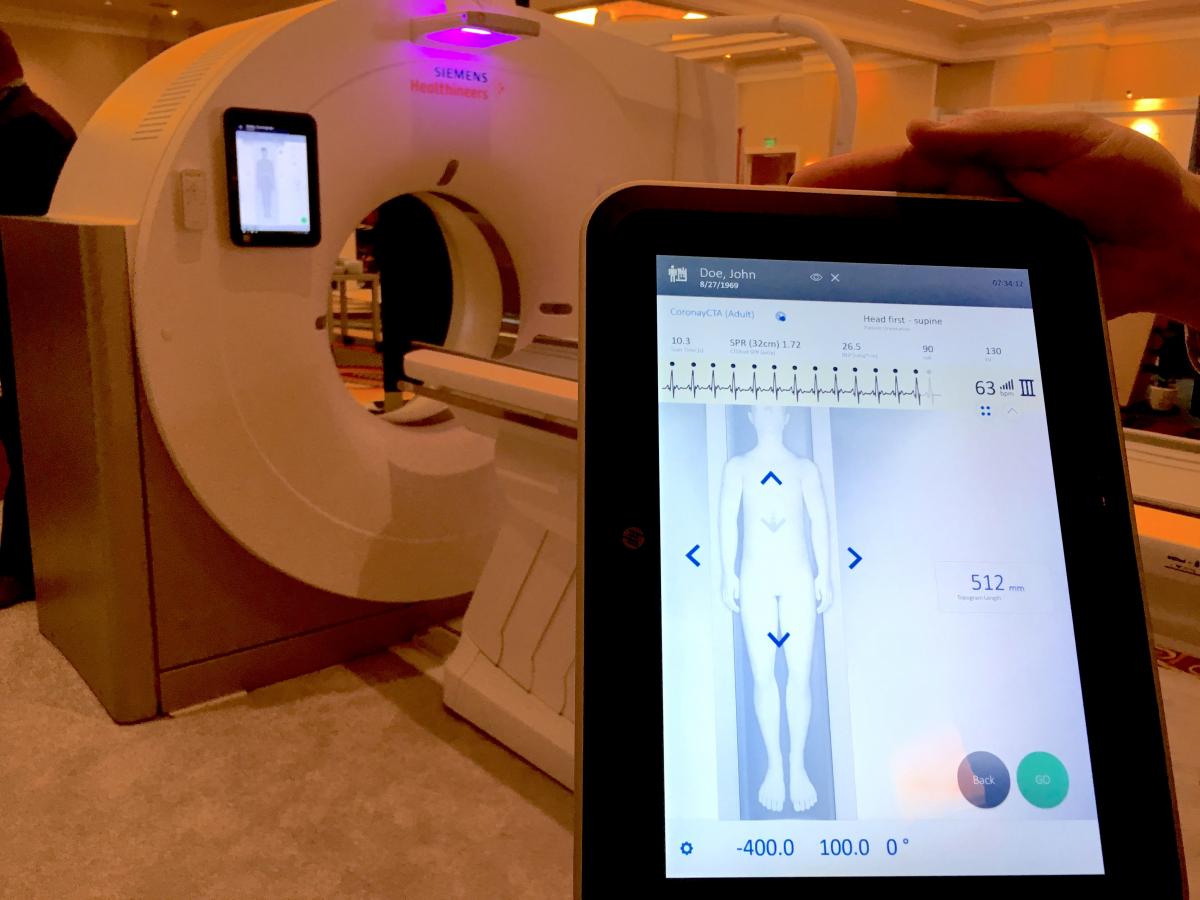 Siemens Go.Top cardiovascular edition CT scanner with its detachable tablets used by the tech to control the scanner so they can stay at the patient's side longer.