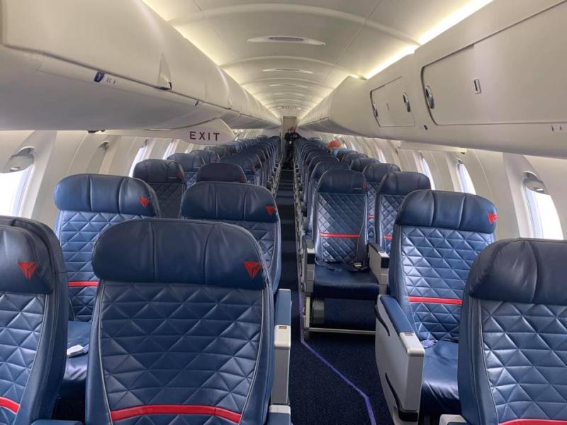 An empty U.S. commercial Delta Airlines flight midweek in late March 2020, when commercial passenger air travel came to sudden halt due to COVID-19 with tens of thousands pf passengers cancelling travel plans many because their meetings, conferences and vacation destinations shut down to aid coronavirus containment efforts. Photo by commercial pilot Andrew Vlack pilot.