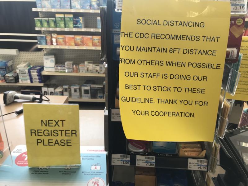 COVID-19 warnings at a CVS pharmacy checkout counter in the Chicago suburbs. Photo by Dave Fornell #coronarvirus #COVID19