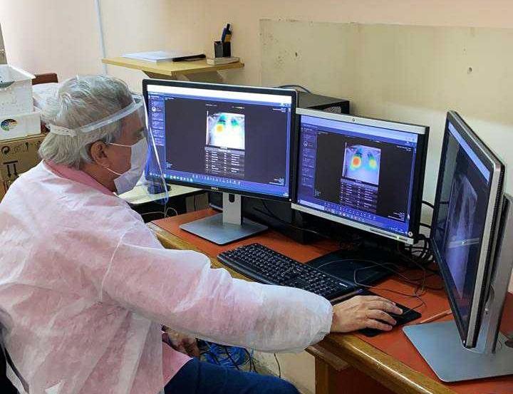 A radiologist in Hospital do Câncer de Pernambuco, located in Recife, Brazil, is examining a chest X-ray image using Lunit Insight CXR. The artificial intelligence software can auto detect and identify in heat map colors areas of the image the radiologist would look at at to confirm a diagnosis. Lunit' AI solution for chest X-ray analysis is now being used and tested in more than 10 countries for COVID-19 management, providing assistance in chest X-ray interpretation during patient triage and monitoring. 