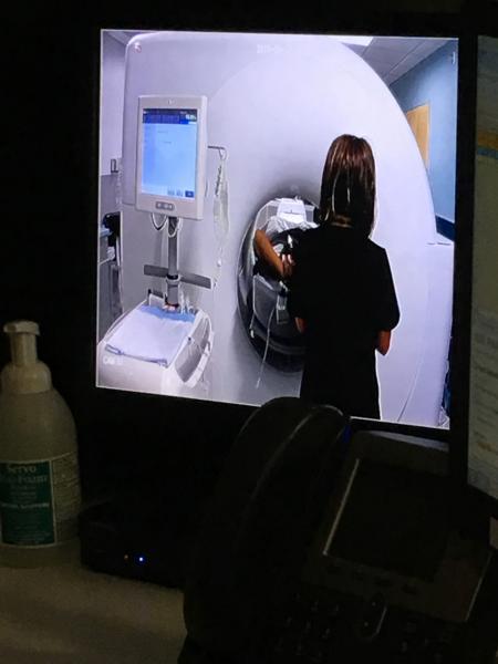 The control room of the dedicated cardiac PET-CT system at Rush University Medical Center in Chicago has a video monitor to see the patient's head and the radiotracer infusion system on the other side of the scanner. Attendees had a chance to visit Rush on a special tour during ASNC 2019.