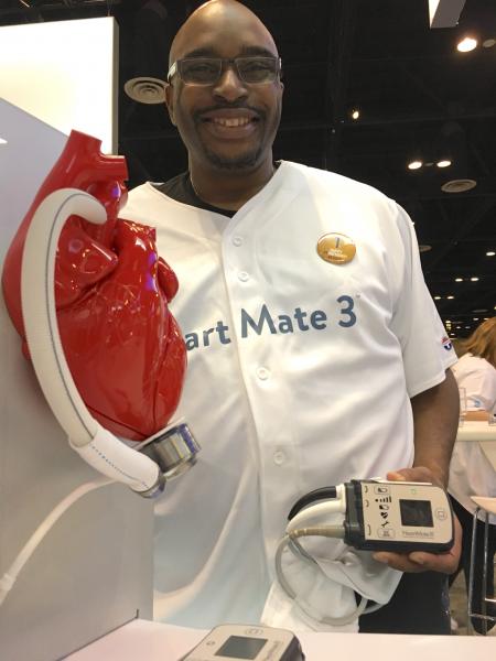 A patient who received the HeartMate III LVAD system showing off his external battery pack. He served as a patient ambassador in the Abbott booth at ACC 2018. The HeartMate III, with its magnetic levitated pump, showed a big reduction in clotting over previous LVADs in a key late-breaking trial at ACC earlier this year.