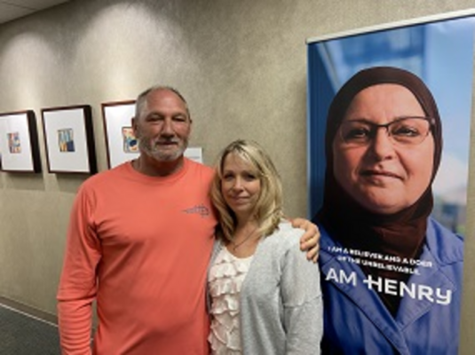 Fred Casciano, with wife Annette, is first patient to receive a new cath lab coronary artery bypass procedure at Henry Ford Health in Detroit.