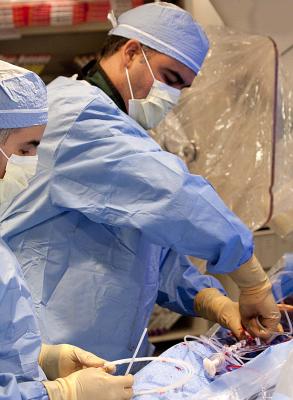 Marco Costa, M.D., Ph.D., MBA, president, UH Harrington Heart and Vascular Institute, performing a cath lab procedure.