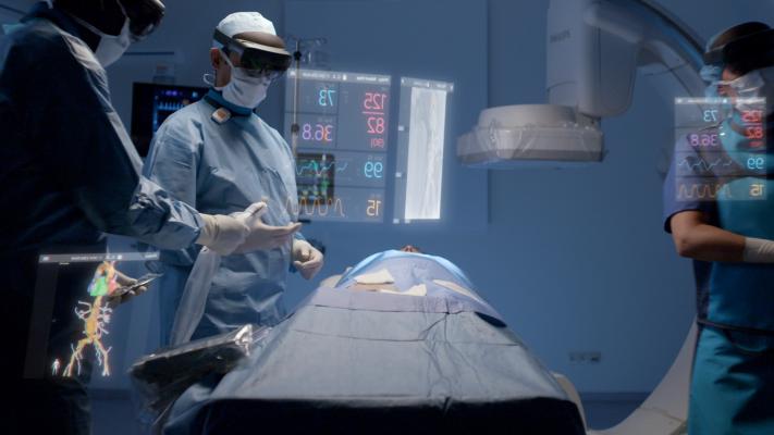Philips and Microsoft have partnered to develop an augmented reality system to help imporve workflow and procedural navigation in the cath lab. Physicians wearing visors can view and interact with true 3-D holograms of anatomy and view things like hemodynamic data.