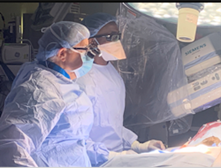 Dr. Sean O'Donnell (left) and Dr. Brijesh Mehta perform the first TCAR procedure in Broward County in 2021. 