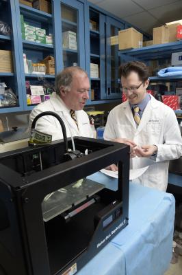 A 3-D printer in use to create anatomical models of complex patient anatomy at North Shore-LIJ Health System Feinstein Institute for Medical Research, Manhasset, N.Y. 3-D printing, 3D printing in medicine