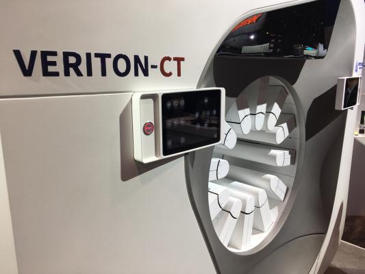 The Spectrum Dynamics Veriton SPECT-CT system. It uses a robotic arms to extend the SPECT detectors as close to the patient as possible to improve image quality and better focus on specific organs. #RSNA #RSNA18 #RSNA2018