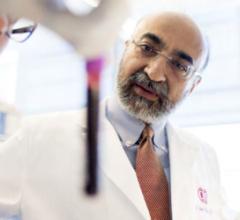 Sumeet Chugh, MD, shown at work in his Cedars-Sinai laboratory