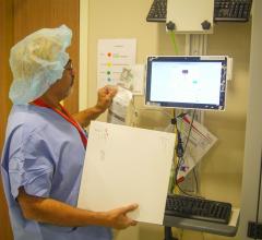 RFID inventory management system in use scanning in cath lab supplies using a Cardinal Health system