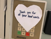 A thank you note for clinicians as they enter a key card access door at Henry Ford Hospital in Detroit. That health system has been in the middle of one of the COVID-19 hotspots in the U.S. and has had more than 800 employees diagnosed with the virus as of mid-April 2020. Photo by Henry Ford Hospital. 