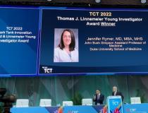 CRF Faculty member David Cohen, MD and CRF Program Director Gary Mintz, MD, announce the winner of the Young Investigator Award during this year's TCT Symposium.