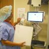 RFID inventory management system in use scanning in cath lab supplies using a Cardinal Health system