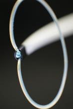 LAA. LAAO, laa occluder, left atrial appendage, Lariat. The SentraHeart Lariat Suture Delivery Device delivers uses a pre-tied suture loop that is used to tie the LAA closed externally the through a traditional open surgical procedure, or through an access port as small as 5 mm. 