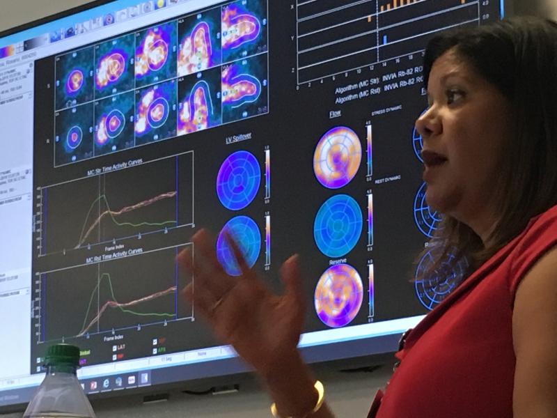 Rupa Sanghani, M.D., FASNC, director of Rush's nuclear cardiology and stress laboratory, explaining to ASNC 2019 attendees how Rush implemented its program during a tour of its PET-CT suite.